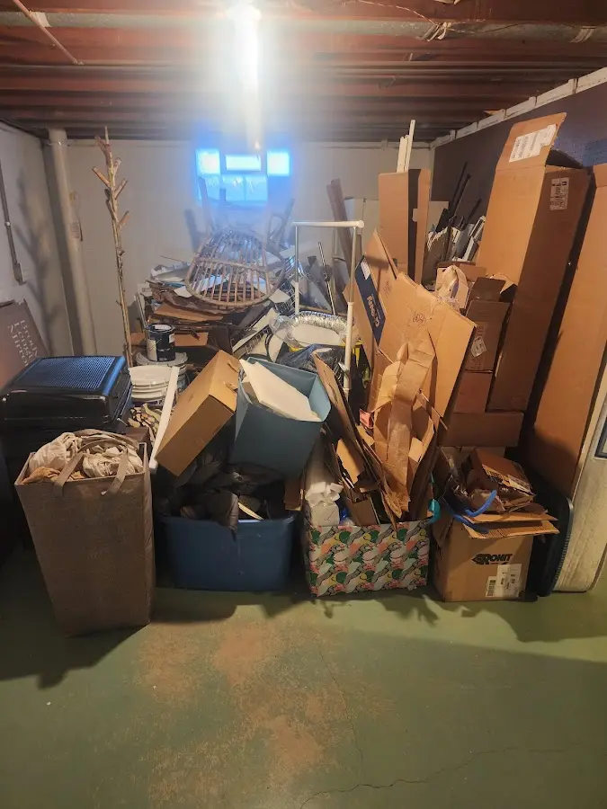 Roll-off dumpster container at job site for 20 Yard Dumpster Rental in North East